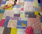 quilt made from old baby clothes
