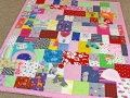 blanket made out of baby clothes