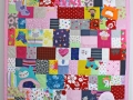 blanket made out of baby clothes