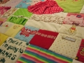 make a quilt out of baby clothes