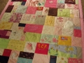 make a blanket out of baby clothes