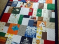patchwork quilt from baby clothes