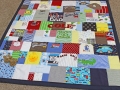 quilt made from old baby clothes