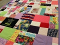 quilt made from baby clothes