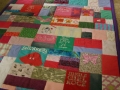quilt made from baby clothes