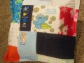 quilt made from baby clothes