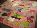 quilt made from baby clothes