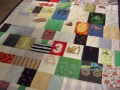quilt made from baby clothes