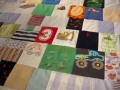 quilt made from baby clothes