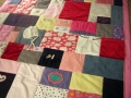 quilt made from baby clothes