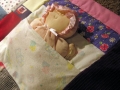 quilt made from baby clothes