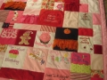 quilt made from old baby clothes