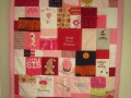 quilt made from old baby clothes