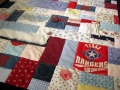 quilt made from baby clothes