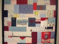 quilt made from baby clothes