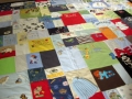 make a quilt out of baby clothes