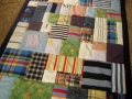 make a quilt out of baby clothes
