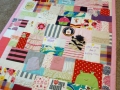 quilt made from baby clothes