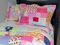 quilt made from old baby clothes
