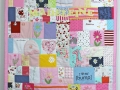 quilt made from old baby clothes