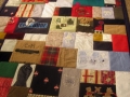 make a quilt out of baby clothes