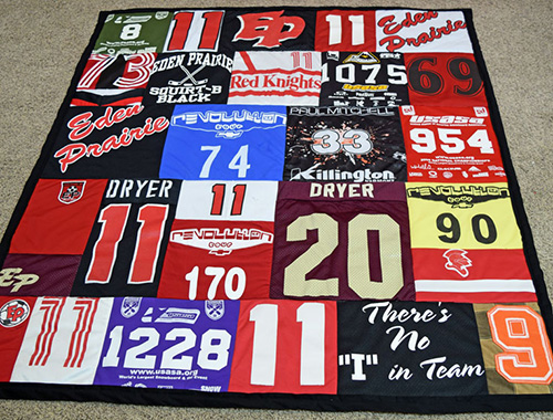 T-shirt quilts are perfect for high school or college graduation, sports jerseys, sorority/fraternity t-shirts, or to preserve a collection of race, event, vacation or concert tee shirts. Create your t-shirt quilt at JellyBeanQuilts.com #shirtquilt #sportsjerseyquilt