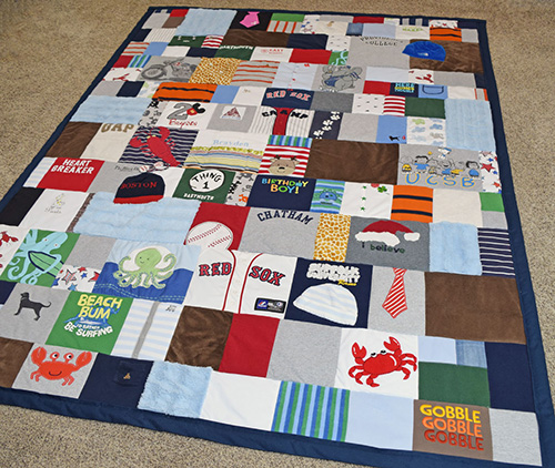 Check out this quilt from old baby clothes - too cute! #babyclothesquilt